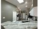 Modern kitchen featuring sleek countertops, stainless steel appliances, and a convenient breakfast bar at 2410 Sweetwater Blvd, St Cloud, FL 34772