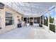 Covered outdoor patio with tile flooring and a sink at 2454 Quail Run N Blvd, Kissimmee, FL 34744