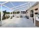 Open-air patio with a white frame offering a clear view of the outdoors at 2454 Quail Run N Blvd, Kissimmee, FL 34744