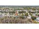 Aerial view of a neighborhood with many trees at 2507 Talega Dr, St Cloud, FL 34772