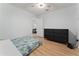 Simple bedroom with a dresser and patterned bedspread at 2507 Talega Dr, St Cloud, FL 34772