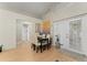 Bright dining area features a table for four, a door to the patio, and ample natural light at 2507 Talega Dr, St Cloud, FL 34772