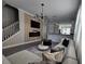 Inviting living room with elegant decor, modern lighting, and comfortable seating arrangement at 2621 Amati Dr, Kissimmee, FL 34741