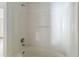 Bright bathroom features a tub and shower combination with neutral finishes at 2826 Club Cortile Cir # B, Kissimmee, FL 34746