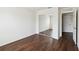 Simple bedroom features wood flooring and mirrored closet doors at 2828 Club Cortile Cir # B, Kissimmee, FL 34746