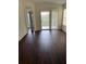 Bedroom with lots of natural light and a sliding glass door to the balcony at 2828 Club Cortile Cir # B, Kissimmee, FL 34746
