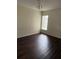 Dining room with hardwood floors and a chandelier at 2828 Club Cortile Cir # B, Kissimmee, FL 34746