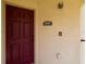 Close-up of the front door of Unit 2828B with visible apartment number at 2828 Club Cortile Cir # B, Kissimmee, FL 34746