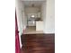 View of the kitchen with white appliances, tile floors, and white cabinets at 2828 Club Cortile Cir # B, Kissimmee, FL 34746