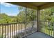 Screened patio offers serene views of the surrounding nature at 2828 Club Cortile Cir # B, Kissimmee, FL 34746
