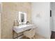 Bright vanity area featuring a lighted mirror, white countertop, and gold accents at 2851 Wagon Ct, St Cloud, FL 34772