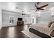 Large main bedroom with wood floors, decorative ceilings, and wainscotting at 2851 Wagon Ct, St Cloud, FL 34772