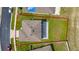 An aerial view showing the property's well-manicured lawn and outdoor living space at 3053 Royal Tern Dr, Winter Haven, FL 33881