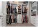 Walk-in closet with custom shelving and ample storage space for clothes and accessories at 3053 Royal Tern Dr, Winter Haven, FL 33881