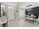 A stunning dining area with modern lighting, stylish decor, and seating for six at 3053 Royal Tern Dr, Winter Haven, FL 33881