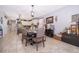Dining room includes table and seating; open to kitchen with lots of natural light at 3159 Somerset Park Dr, Orlando, FL 32824