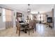 Inviting dining area with large table, ample seating, and decorative accents at 3159 Somerset Park Dr, Orlando, FL 32824