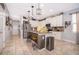 Bright, open kitchen with modern stainless steel appliances, tile backsplash, and island at 3159 Somerset Park Dr, Orlando, FL 32824