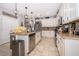Modern kitchen with granite countertops, stainless steel appliances and lots of storage at 3159 Somerset Park Dr, Orlando, FL 32824
