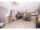 Open concept living room, dining room and kitchen features tile floors and natural light at 3159 Somerset Park Dr, Orlando, FL 32824
