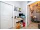 Cute office nook off of doorway with built-in desk, storage, and adjacent door at 3159 Somerset Park Dr, Orlando, FL 32824