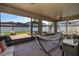 Relaxing screened patio featuring brick pavers, a hammock, and comfortable seating area at 3159 Somerset Park Dr, Orlando, FL 32824