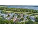 An aerial view showcases a beautiful neighborhood with easy access to the lake at 3349 Schoolhouse Rd, Harmony, FL 34773