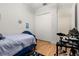 Bright bedroom with a bed, closet, and hardwood floors, offering a cozy and functional space at 3349 Schoolhouse Rd, Harmony, FL 34773