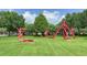An open green space provides public art for residents to enjoy in the community at 3349 Schoolhouse Rd, Harmony, FL 34773