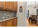 Kitchen area with granite countertops and decorative backsplash at 3349 Schoolhouse Rd, Harmony, FL 34773