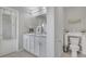 Bathroom includes double vanity, a toilet and a framed mirror at 3400 Mt Vernon Way, Kissimmee, FL 34741