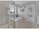 Bathroom features a glass-enclosed shower, soaking tub and natural light at 3400 Mt Vernon Way, Kissimmee, FL 34741