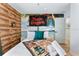 Charming themed bedroom with decorative wall art, creating a fun and playful space at 344 High Point Dr, Davenport, FL 33837