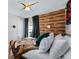 Another view of the themed bedroom showing natural light and decorative pirate themed wall art at 344 High Point Dr, Davenport, FL 33837