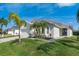 Charming single-story home with a well-manicured lawn, fresh landscaping, and a two car garage at 344 High Point Dr, Davenport, FL 33837