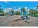 Community playground featuring slides, climbing structures, and a safety surface at 3899 Mount Vernon Way, Kissimmee, FL 34741