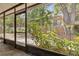 View from screen enclosed porch to the fenced yard beyond at 411 Sheoah Blvd # 33, Winter Springs, FL 32708