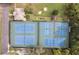 Aerial view of community tennis courts, surrounded by landscaping, offering an active lifestyle at 411 Sheoah Blvd # 33, Winter Springs, FL 32708