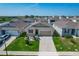 Spacious single-story home situated in a well-planned community, featuring a manicured lawn at 591 Lake Smart Blvd, Winter Haven, FL 33881