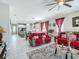 Expansive open-concept living space with comfortable seating and clear sightlines to the adjacent kitchen at 591 Lake Smart Blvd, Winter Haven, FL 33881