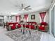 Open-concept living space featuring modern furnishings, tile flooring, and direct access to the kitchen at 591 Lake Smart Blvd, Winter Haven, FL 33881