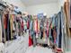 Organized walk-in closet offering ample storage space for clothes, shoes, and accessories at 591 Lake Smart Blvd, Winter Haven, FL 33881