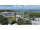 Wide aerial shot of the clubhouse and marina offering lake views and boating access at 621 Rebecca Dr, St Cloud, FL 34769