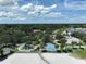 Aerial view showcasing a beachfront park with playgrounds, marina, and recreational amenities at 621 Rebecca Dr, St Cloud, FL 34769