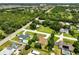 An aerial shot showcases the neighborhood and highlights its desirable location and nearby amenities at 621 Rebecca Dr, St Cloud, FL 34769