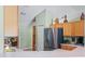 Modern kitchen showcasing stainless steel appliances and ample cabinet space at 621 Rebecca Dr, St Cloud, FL 34769