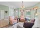 Inviting living room with a classic rug, comfortable seating, and natural light at 621 Rebecca Dr, St Cloud, FL 34769