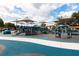 Community playground featuring state-of-the-art equipment and shaded structures for children of all ages to enjoy at 621 Rebecca Dr, St Cloud, FL 34769