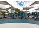 Community playground featuring multiple slides and bridges offering endless opportunities for to explore and play at 621 Rebecca Dr, St Cloud, FL 34769