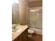 Bathroom featuring a shower-tub combo and vanity at 6957 Northwich Dr, Windermere, FL 34786